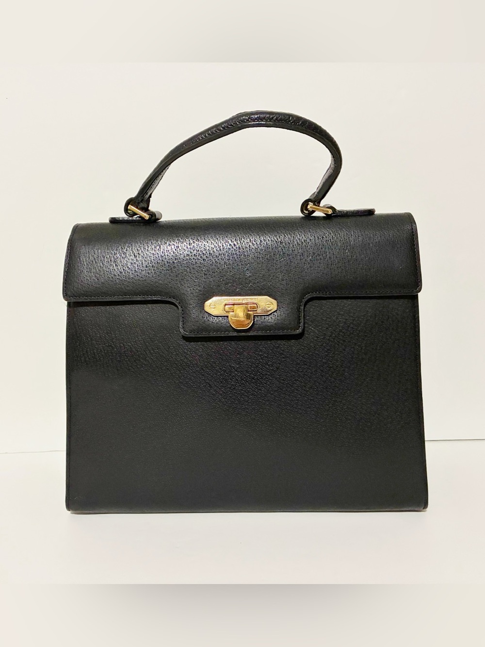 Authentic Valentino Garavani Black Leather Medium handbag with Gold Hardware